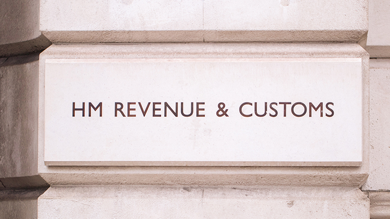 Simple carved lettering of HM revenue & Customs outside the Westminster offices in London. UK