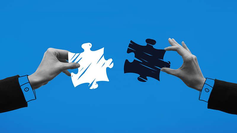 Contemporary art collage. Hands holding puzzle pieces and trying to connect it against blue background. Concept of business, acquisition, retention, merger, partnership, office,