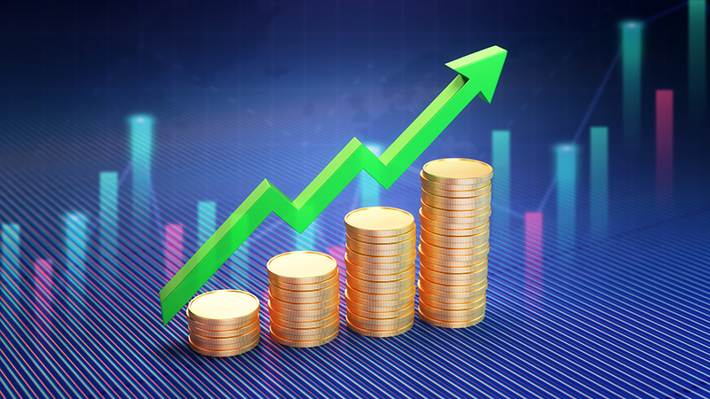 Up arrow with stacks of coins on Blue Financial Stock Exchange Graph Background