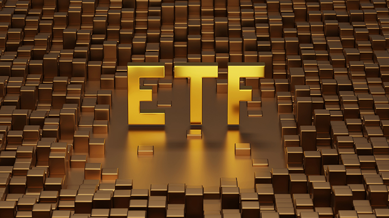 Golden ETF solid word on metallic cubes. 3d illustration.