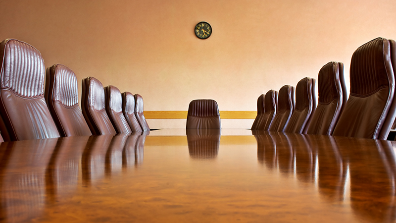 Meeting room with a big polished table and arm-chairsOther photos from this business series: