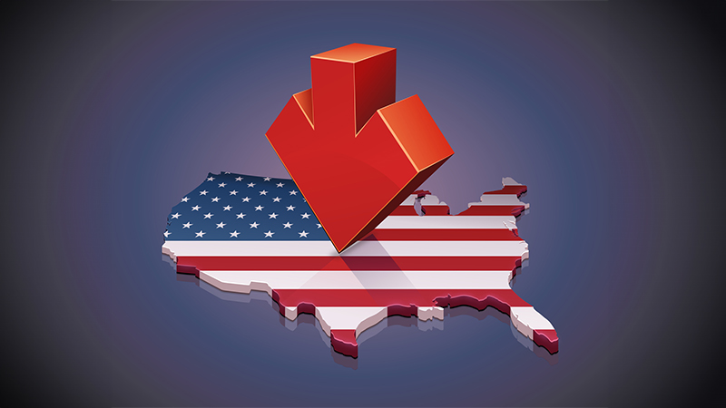 3D map of the United States with the American flag on which is placed a red arrow pointing downwards indicating a decline or a recession on a dark background